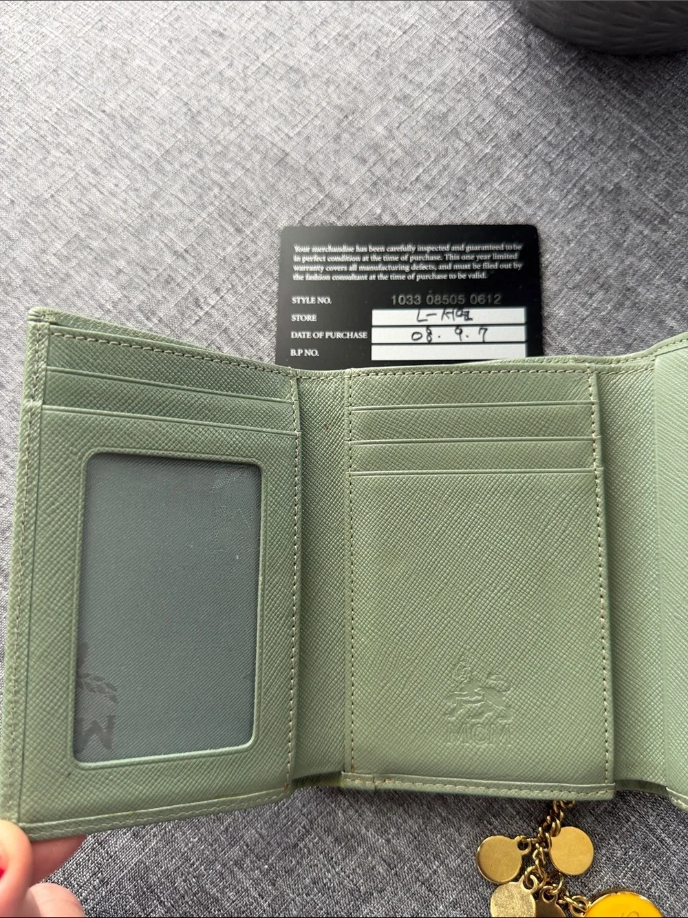 MCM Green Leather Compact Wallet with Gold Accents and Charm - Picture 7 of 10